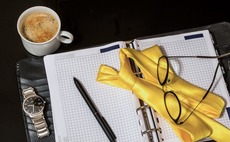 coffee-notebook-glasses-resignation-watch-pen