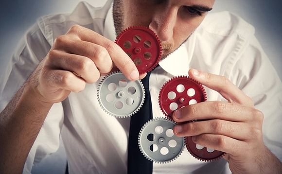 integration-cogs-wheels-man integration-cogs-wheels-man