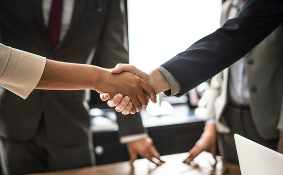 business-meeting-handshake business-meeting-handshake