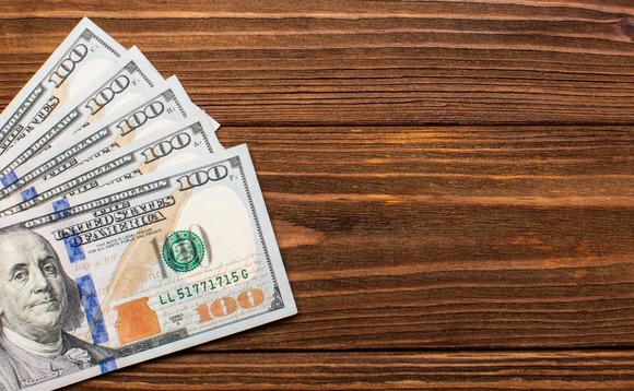 dollar-money-bills-table dollar-money-bills-table