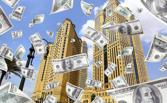money-falling-top-building-23765132 money-falling-top-building-23765132
